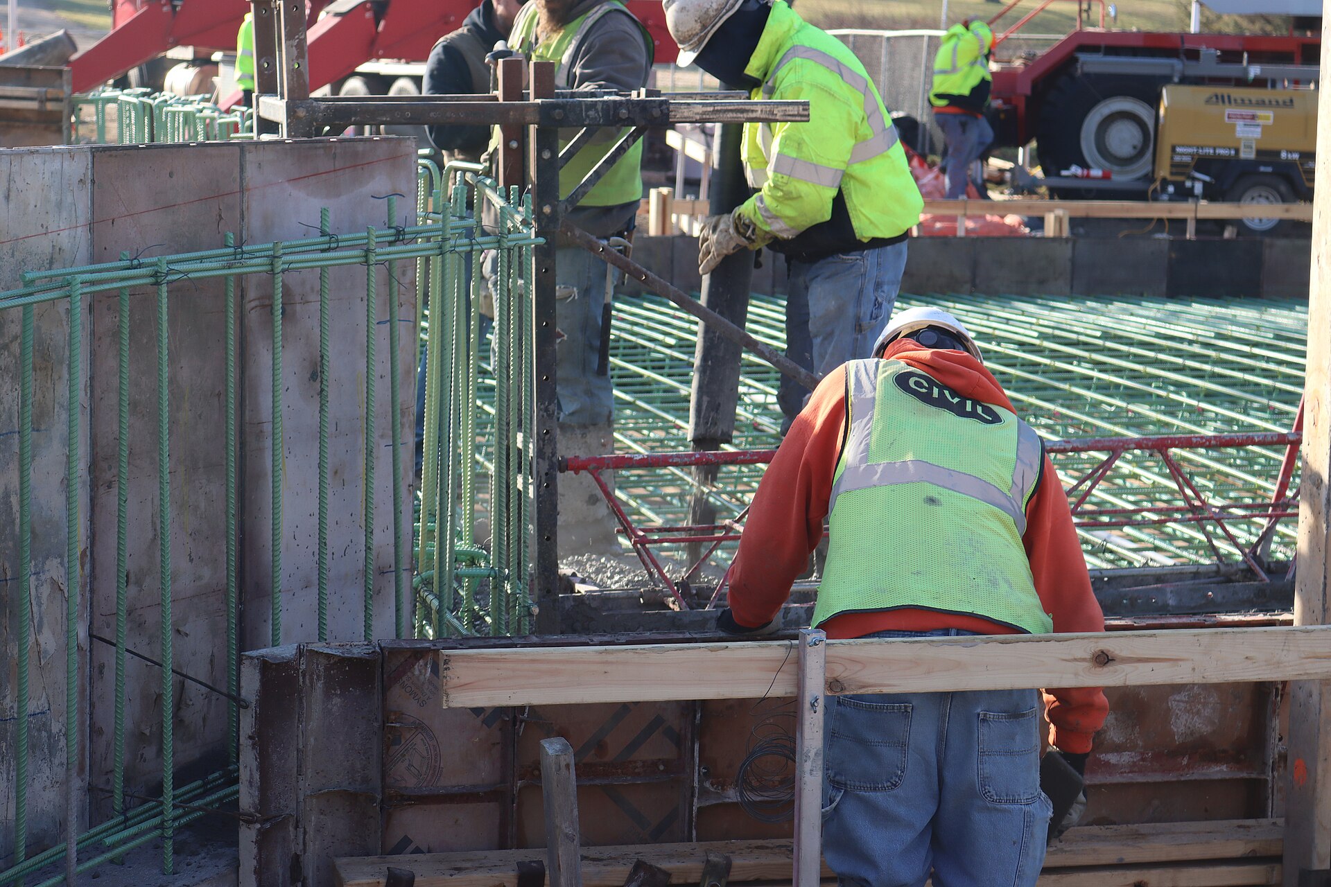 Workers preparing a bridge deck during construction